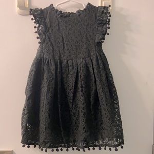 Black lace with pompom trim, size 4 toddler dress.